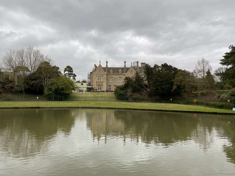 Looking across the main lake to Beckett House. Photo by Neil B. Maw