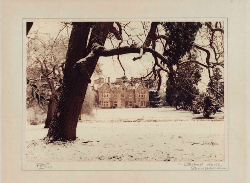 Beckett House in the distance in the snow - a photograph by Mervyn Penny