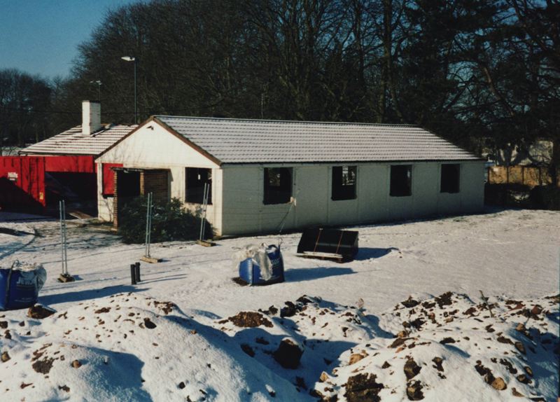 The old school canteen with a covering of snow before it was demolished