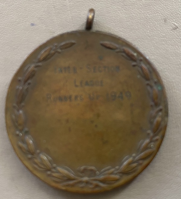 The engraved side of the medal