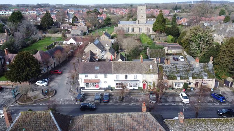 The Shops & the Prince of Wales pub from the air. Photo by Neil B. Maw