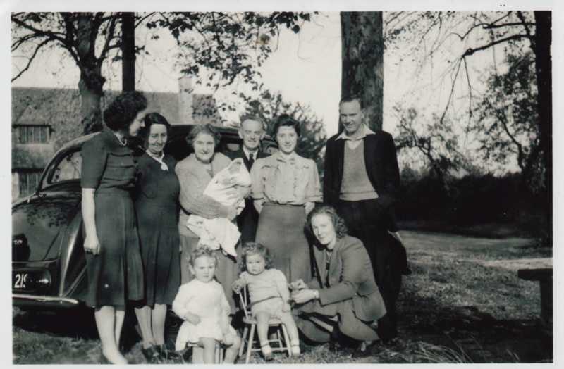 Brian Higgs family outside the Memorial Hall, Shrivenham, circa 1950