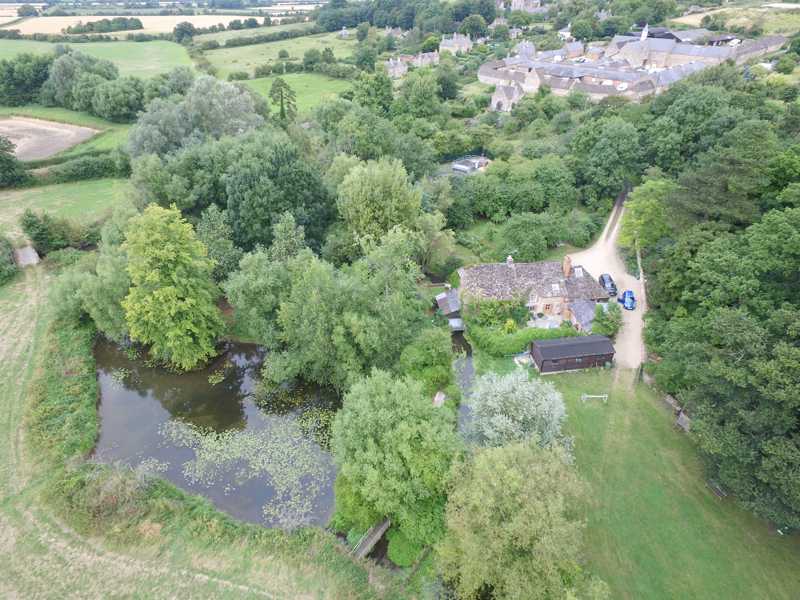 View from the air with the leet approaching the mill wheel. Photo by Neil B. Maw