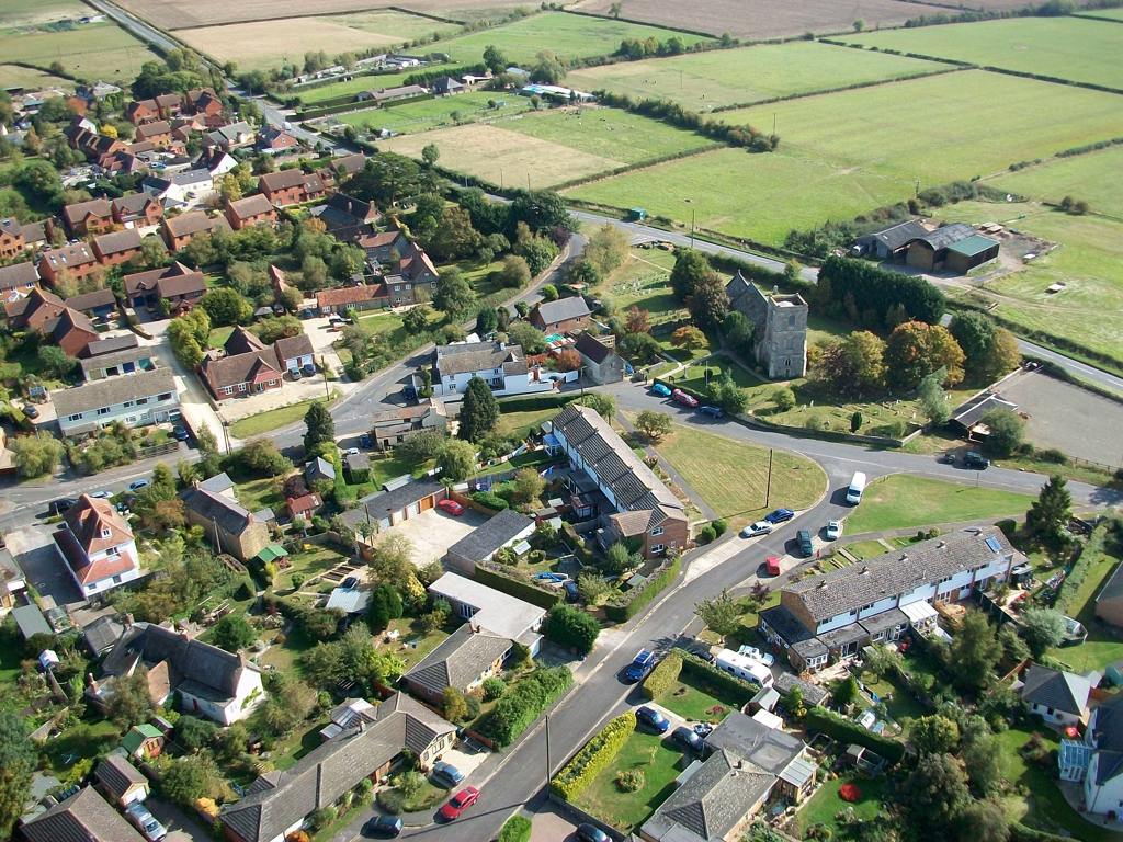 Longcott village showing the Church and the cottage on the north wall that was used as a School for Girls