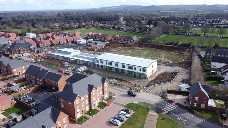 New School from the north looking towards the village. Photo by Neil B. Maw