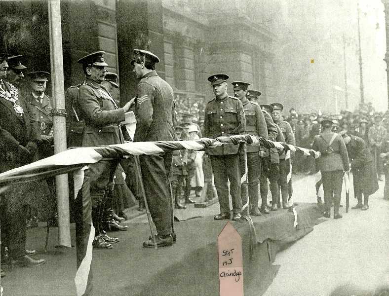 Harold Claridge receiving his medal