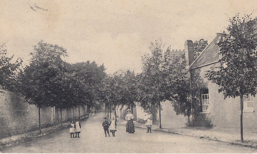 The photo showing people in Church Walk. Note the gates at the top of the walk, replaced in 1912 by the current Lytchgate